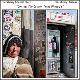 A photograph of a porcelain Native American Indian woman sitting next to a pay phone booth in Hackberry, Arizona on Route 66.